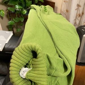 Sweater light green turtle neck with buttons on the sleeves and on the sides!